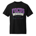 Revive Thredz graphic tee with clean typography reading focus on progress not perfection Healthcare professional wearing the ultra soft progress not perfection mindset shirt under scrubs